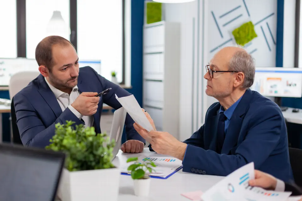 Business professionals reviewing their next steps together